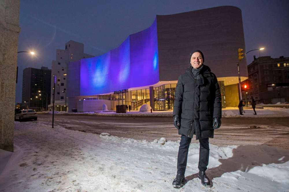 Photo by Mikaela MacKenzie / Win
Stephen Borys, director and CEO of the Winnipeg Art Gallery, posed outside Qaumajuq on the night its exterior was lit to resemble the aurora borealis