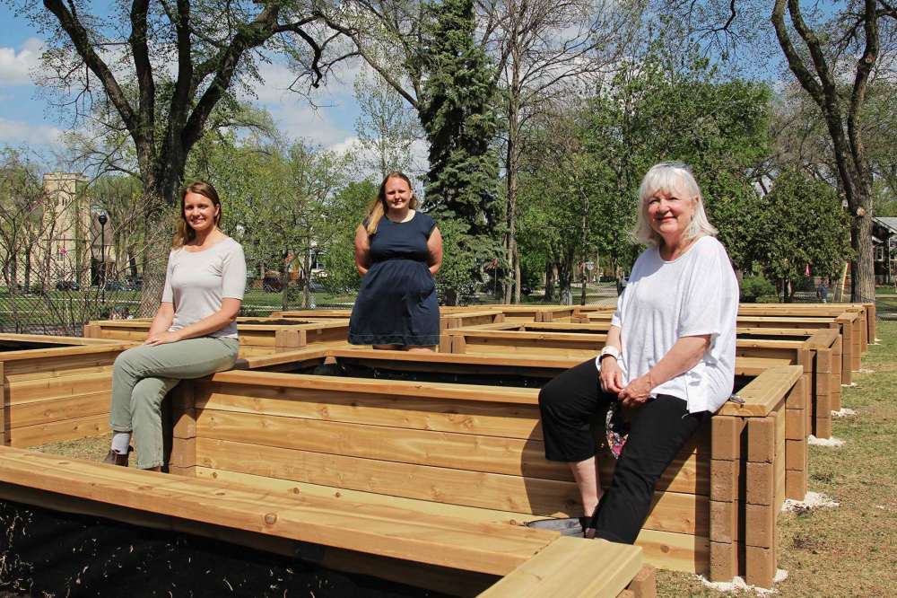 Photo by Katlyn Streilein
(From left) Wolseley Residents’ Association green space committee members Jade Raizenne, Lara Stregger, and Erna Buffie are pictured with the group’s new garden beds at Vimy Ridge Memorial Park. The WRA green space fundraised, designed, and built the beds in May 2021.