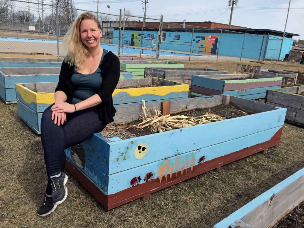 Photo by Simon Fuller
Winakwa Community Garden committee chair Christine Mousseau is pictured at the Windsor Park-based garden with some of its raised wooden garden boxes on April 7.