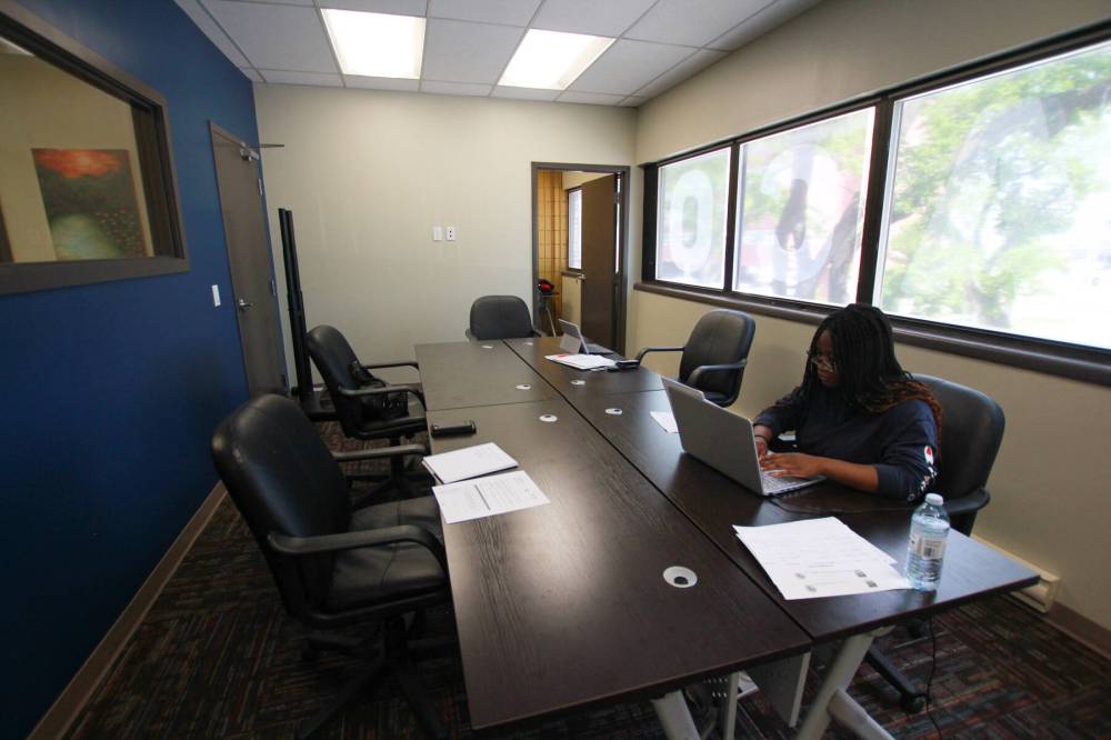 Acomi’s new Fort Rouge hub features a board room, among other amenities. Affiliate members and community groups are invited to rent the space at an affordable rate, says organization president Titi Tijani.