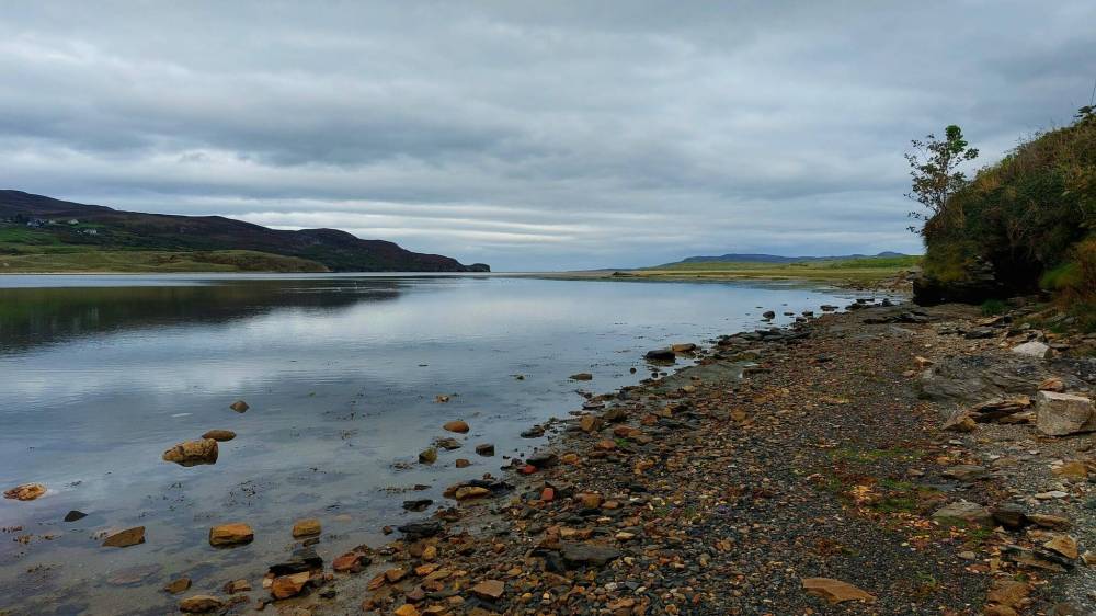 Photo by RoseAnna Schick
The Kilahoey Beach Walk offers a serene coastal experience with scenic views, framed by the picturesque backdrop of rugged hills and cliffs.