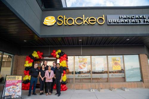 Supplied photo
                                City counciller Devi Sharma (Old Kildonan) was on hand for the grand opening of Stacked Pancake and Breakfast at 2221 McPhillips St., along with (front row, from left) Frank Genovese of Stacked; franchisees Yatri Patel and Henis Patel; as well as Darren Firman and Alex Shaw, both of Stacked.