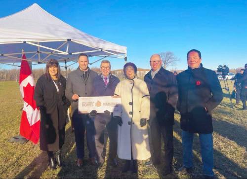 On Nov. 12, at the Naawi-Oodena site, representatives of all three levels of government announced a Direct Build project which will create 320 new homes, with at least 40 per cent offered below market value to support families with moderate and median incomes. Pictured are (from left): Manitoba Housing Minister Bernadette Smith; Winnipeg South Centre MP Ben Carr; Winnipeg West MP Doug Eyolfson, Saint Boniface – Saint Vital MP Ginette Lavack; Winnipeg mayor Scott Gillingham; Chief Gordon BlueSky of Brokenhead Ojibway Nation.