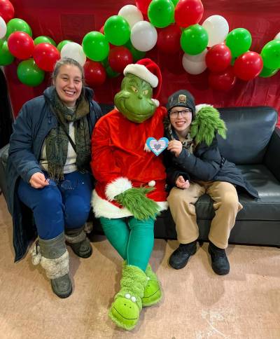 Supplied photo
                                At the North End Women&rsquo;s Centre, kids and caregivers lined up for free photos with the Grinch during Light Up the Avenue, which was held Dec. 11 on Selkirk Avenue.