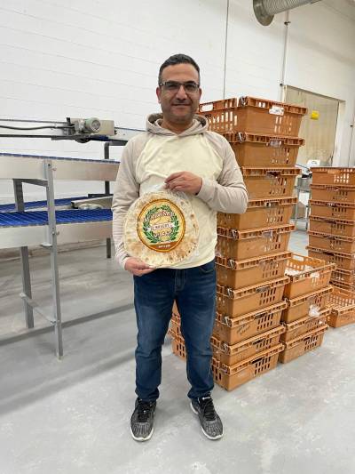 Photo by Simon Fuller
                                Shhade Al Mansour arrived in Winnipeg with his wife and their five children as Syrian refugees, via Lebanon, in 2014.
