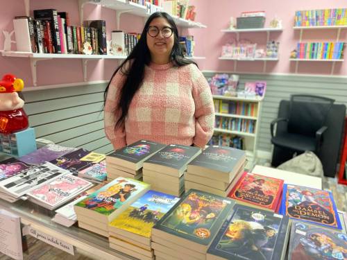 Photo by Sheldon Birnie
                                Dylan Yuen is the owner of Bound to Please Books, a new, romance-focused bookstore that specializes in books by local authors, located at 995 McPhillips St.