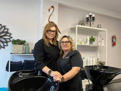 Photo by Sheldon Birnie
                                Mila Zhezherun (left), owner of new hair salon Flamingo Studio, and Kerry Harrison, Zhezherun&rsquo;s mentor. Flamingo Studio (113 Regent Ave. W) will celebrate its grand opening on Feb. 28.