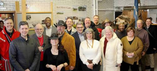 Supplied photo
                                A host of local politicians were on hand at the St. Vital Museum on Feb. 14 for the opening of a new exhibit featuring a newly restored Red River cart. They were (from left) Robert Loiselle, Tyler Blashko, John Hindle, Jamie Moses, Kelly and Armand Jerome (Jerome Cartworks), Kerry MacDonald, Brian Mayes, Ginette Lavack, Chris Sigurdson, Peter Bjornson, Irene Nordheim, Renee Cable, Markus Chambers, Billie Cross, Roy Norris and Ian Walker.
