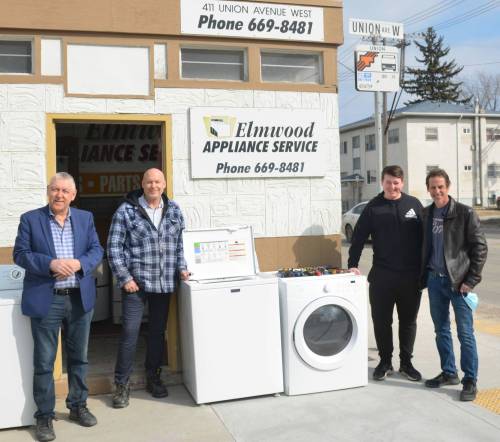 Supplied photo
                                Elmwood MLA Jim Maloway is pictured in March 2021 with Ron Theriault, his son Anthony, and the late city councillor Jason Schreyer. Elmwood Appliance has been servicing and selling appliances in the Elmwood area since 1996.