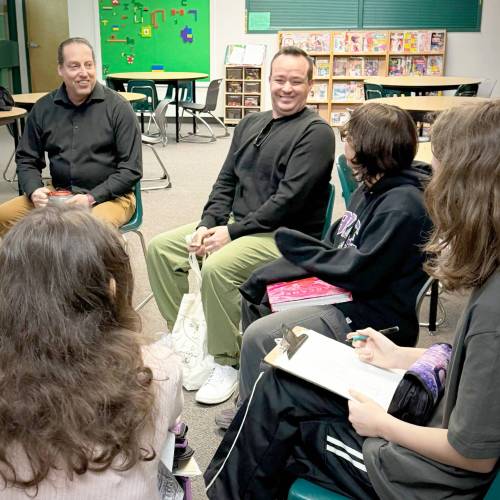 Supplied photo
                                Kirkfield Park MLA Logan Oxenham chats with students in grades 6 and 8 at Bruce Middle School.