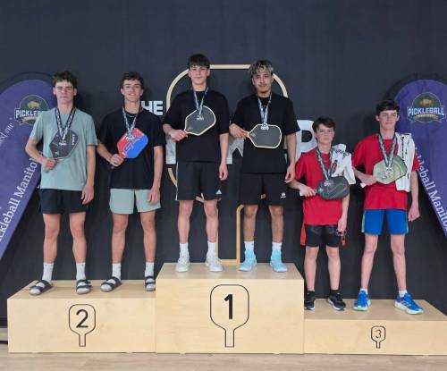 Supplied photo
                                Carlos Mendez and Jayden Lalla (centre) won gold in the boys doubles category at the recent Pickleball Manitoba high school championships.