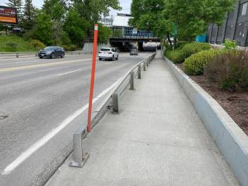 Photo by
                                The sidewalks and roadway that go beneath the Osborne Street underpass are not wide enough to safely accommodate cyclists.