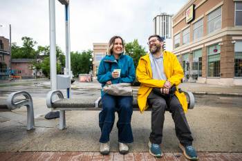 File photo by Mikaela Mackenzie
                                Musician John Samson Fellows and Laura Cameron from Climate Action are hopeful that the new Next Stop 50-50 campaign will prompt provincial and municipal governments to increase funding for public transit.