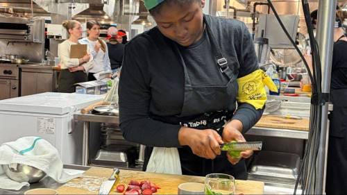 Supplied photo
                                Grade 8 student Adetooni Adegoke working the smoothie station in Montreal where the Gordon Bell students won their second national culinary competiton.