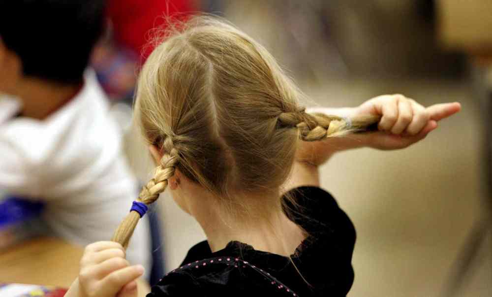 Sarah's braids didn't last the day. (Wayne Glowacki / Winnipeg Free Press)