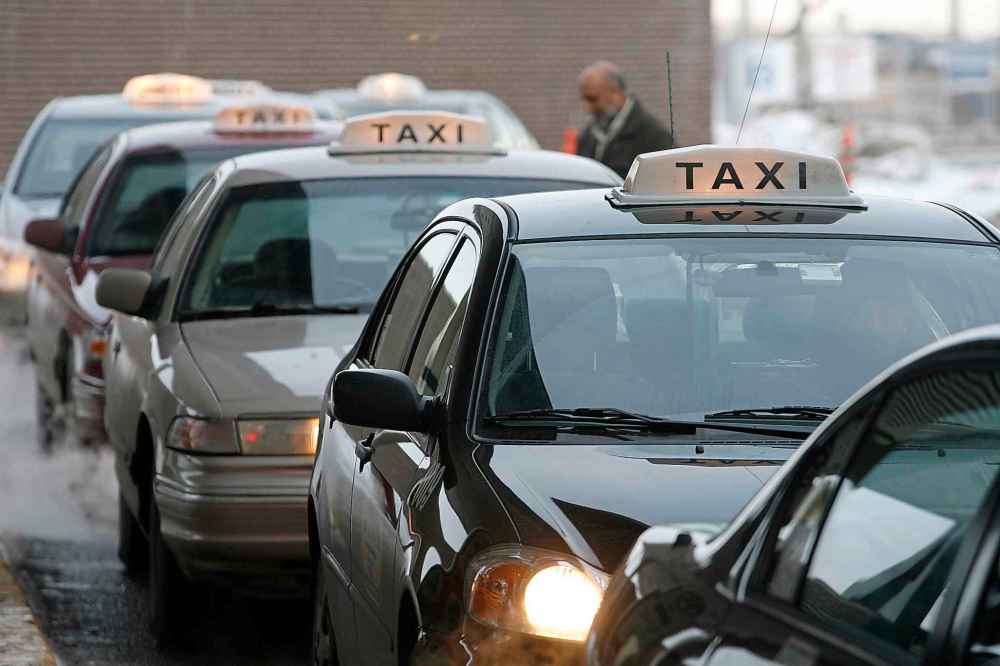 A pre-paid fare could eliminate disagreements over fare disputes, said Grant Heather, the city's manager of vehicles-for-hire. (John Woods / Winnipeg Free Press files)