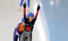 Canada's Ivanie Blondin, foreground, celebrates after winning the women's mass start race as she followed by second placed Irene Schouten, of the Netherlands, during the speed skating World Cup at the Minsk ice arena in Minsk, Belarus, Sunday, Nov. 17, 2019. (AP Photo/Sergei Grits)