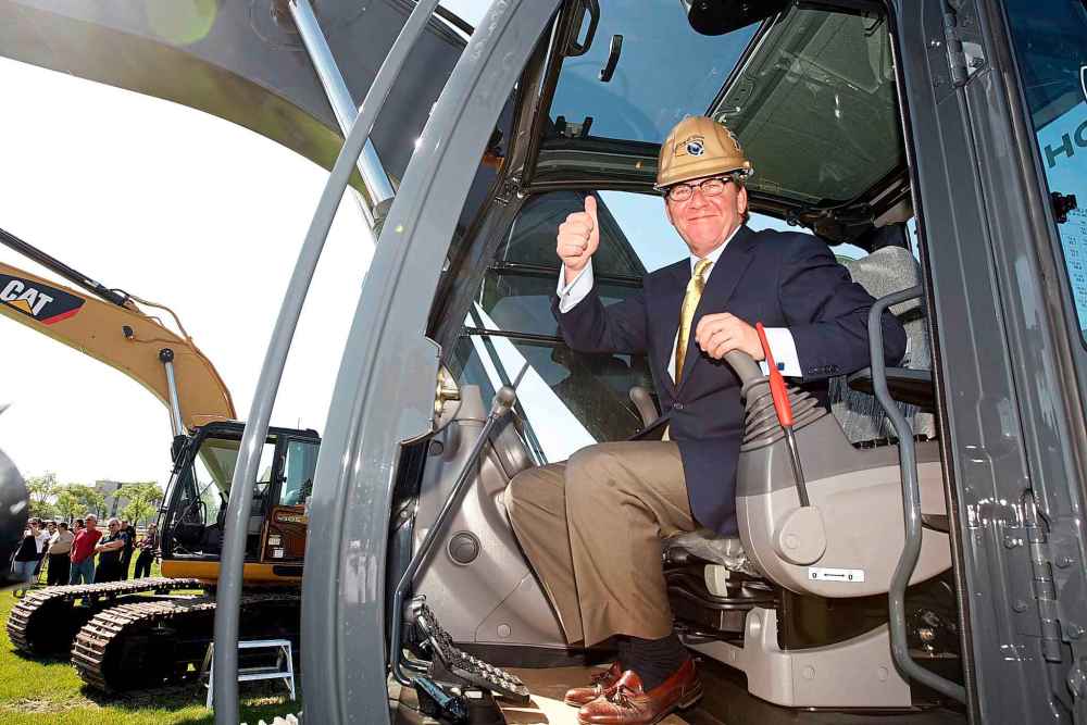 KEN GIGLIOTTI / WINNIPEG FREE PRESS files
David Asper at controls of Digger after ground-breaking of the new football stadium.