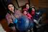John Woods / Winnipeg Free Press
Kaylee Mack and her three young daughters (from left to right) Maykenzie, Gracelyn, and Keanna head out to get water at their grandparents' home Monday. They have been without water for 8 days.