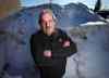 Phil Hossack / Winnipeg Free Press
Gino Riccio poses in front of the evidence: he caught city snow clearing crews dumping snow in his parking lot and has them on surveillance tape.