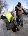 KEN GIGLIOTTI / WINNIPEG FREE PRESS
Workers prepare to thaw frozen water pipes on Mountain Avenue at Salter Street on Monday.