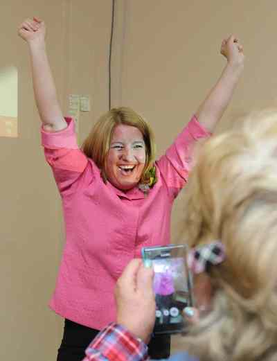 Jason Halstead / Winnipeg Free Press
Daniel McIntyre candidate Cindy Gilroy celebrates victory with supporters at her campaign office on Sargent Avenue on Wednesday, Oct. 22, 2014.