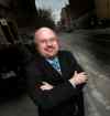 Phil Hossack / Winnipeg Free Press
A grinning Russ Wyatt poses on a Princess Street bike lane Wednesday afternoon.