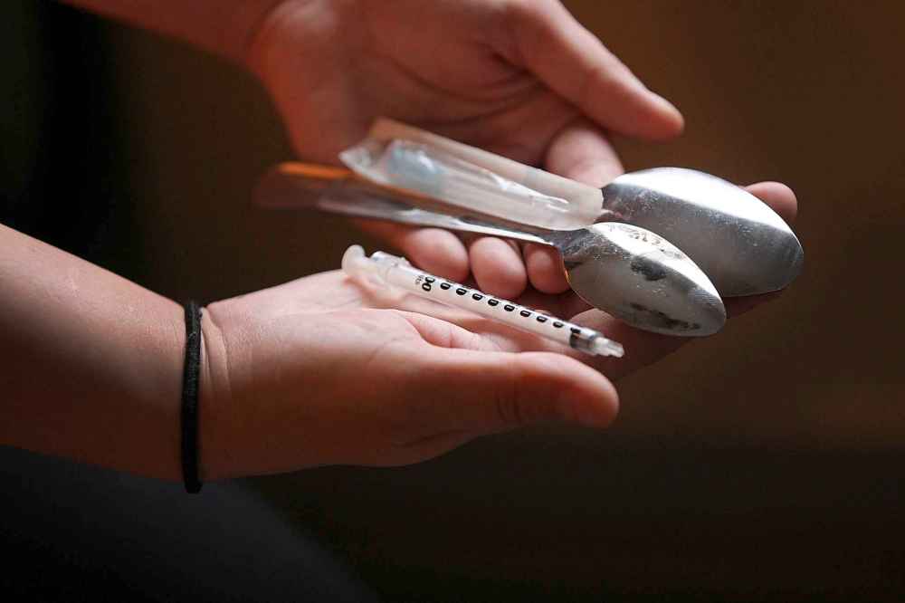 A recovering Fentanyl user in Winnipeg speaks with Free Press reporter Larry Kusch with the agreement of anonymity- She shows us her last cooking spoons and needle that she saved during her use- She threw the paraphernalia out after the interview- See Larry Kusch story–Nov 10, 2015 (JOE BRYKSA / WINNIPEG FREE PRESS)