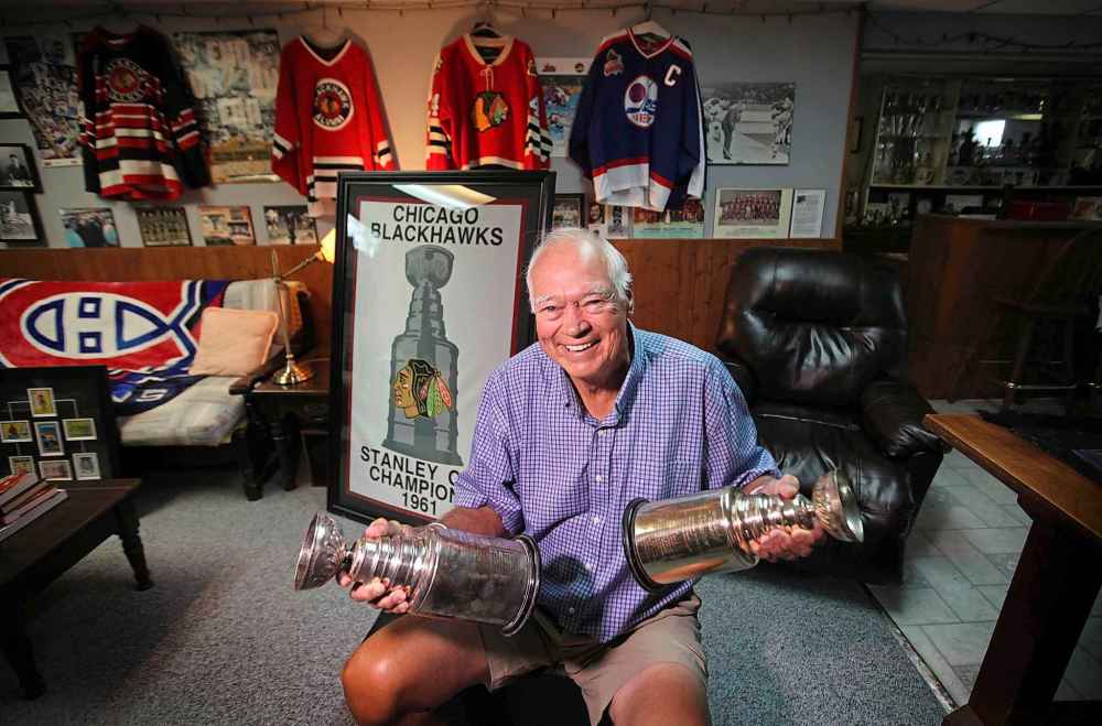 RUTH BONNEVILLE / WINNIPEG FREE PRESS FILES
Ab McDonald in his basement with his memorabilia including two replica Stanley Cups from the 1960 Montreal Canadiens and the 1961 Chicago Blackhawks. Ab has been on four Stanley Cup-winning teams, three in Montreal and one in Chicago. He was raised in Winnipeg and was the first-ever captain of the original Winnipeg Jets.