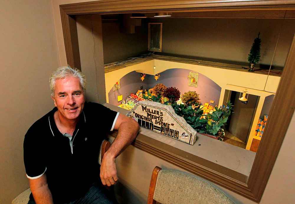 Miller's Meats owner Cameron Miller in his office, which features the former theatre's projection room