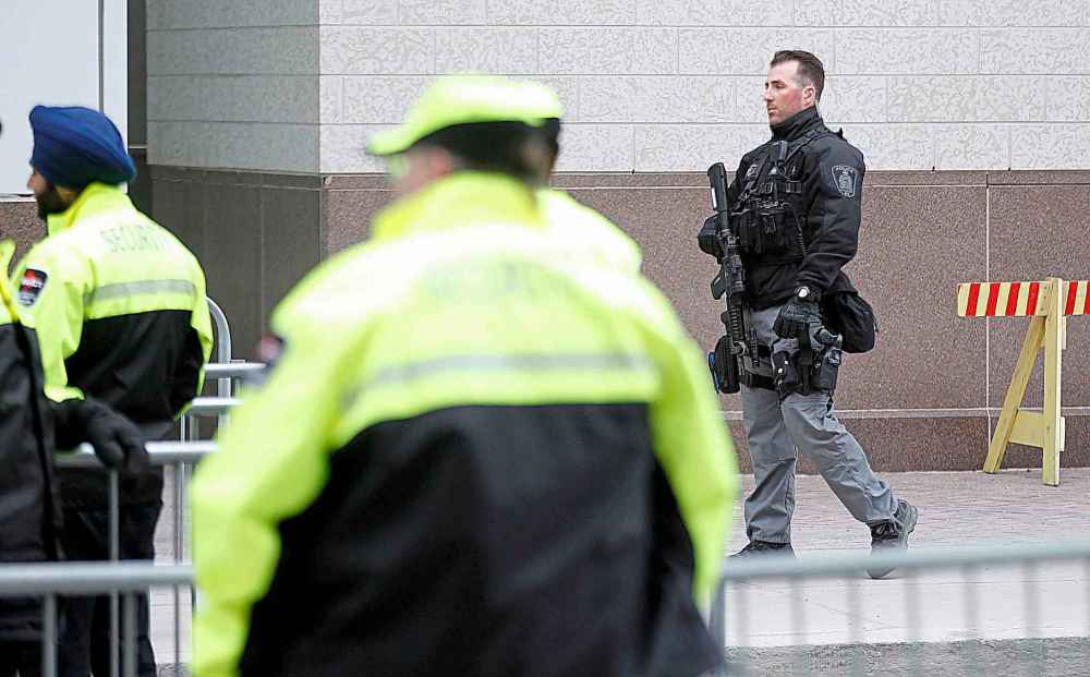 PHIL HOSSACK / WINNIPEG FREE PRESS
City police patrol the area surrounding the street party.