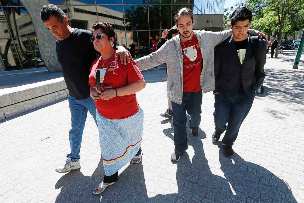 JOHN WOODS / WINNIPEG FREE PRESS
Delores Daniels, mother of Serena McKay, leaves the Manitoba law courts with her family.