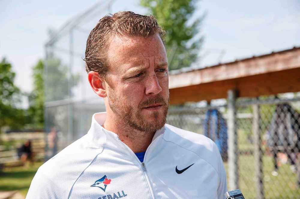 T.J. Burton, the Blue Jays manager of amateur baseball.