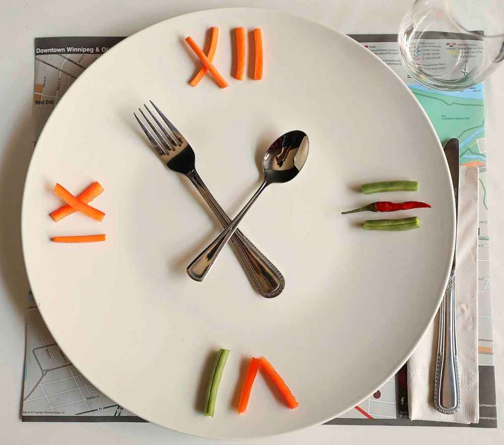 RUTH BONNEVILLE / WINNIPEG FREE PRESS
Cover photo options for 24 hour food project or food for thought project taken at The Merchant Kitchen.  
Various food art photos with different elements like: roman numeral clock made with veggies on a plate, city map as place mate, table cloth and napkin,  the words -Food for Thought, written on a plate with chocolate sauce etc.  Also, server holds plate with words and map of city.  
Goal was to bring in food, 24 hours and map of Winnipeg to illustrate project.
August 15/18