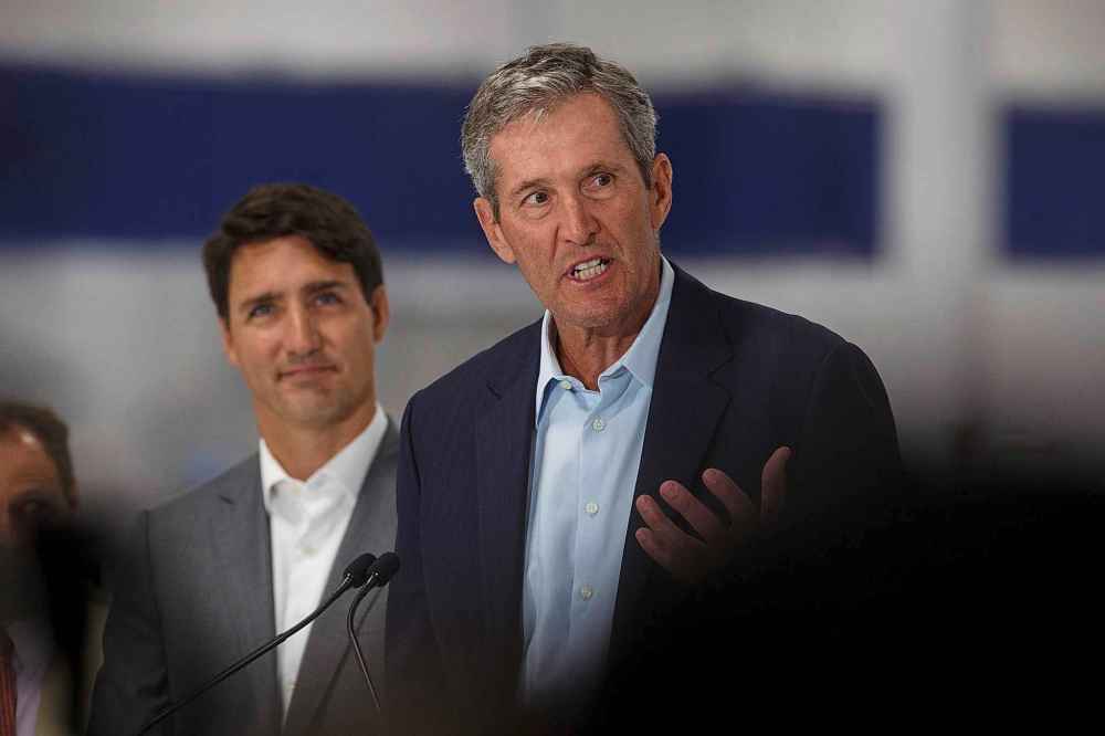 MIKE DEAL / WINNIPEG FREE PRESS
Prime Minister Justin Trudeau looks on while Manitoba Premier Brian Pallister talks during a press conference in Winnipeg in September.