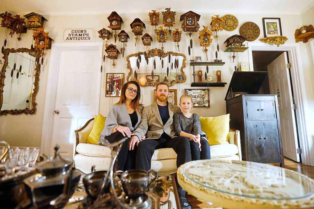 Murray Beilby (centre) with daughter Livia (right) and girlfriend Ainsley (left).