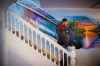 MIKE DEAL / WINNIPEG FREE PRESS
Morberg House, a transitional home for men with addiction. Most of the clients there are meth users.
Ricky Aitken walks down the stairs past beautiful hand painted murals in Morberg House.
181211 - Tuesday, December 11, 2018.