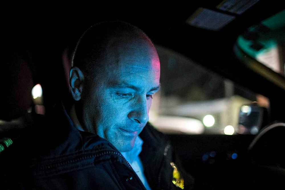 MIKAELA MACKENZIE / WINNIPEG FREE PRESS
Christian Schmidt, deputy chief of the Winnipeg Fire Paramedic Service, checks calls in the car in Winnipeg on Friday, Dec. 14, 2018.
Winnipeg Free Press 2018.