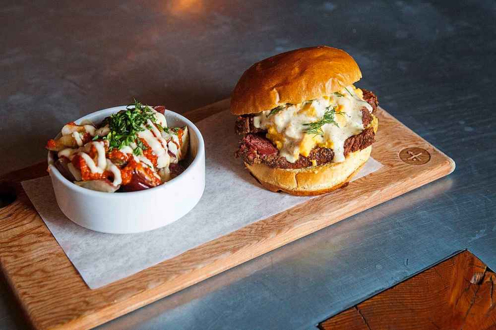 MIKE DEAL / WINNIPEG FREE PRESS
Breakfast at King + Bannatyne -- new breakfast menu
100 King St.
The popular Breakfast Brisket sandwich along with a side of Garlic Roasted Breakfast Potatoes.
190419 - Friday, April 19, 2019.