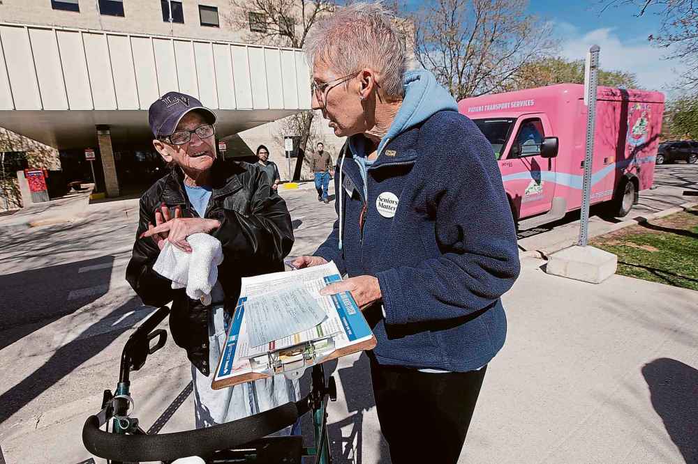 PHIL HOSSACK / WINNIPEG FREE PRESS
Concordia Hospital patient Patricia Koper, left, describes how the hospital has saved her life more than once after signing a petition to keep an ER unit at the hospital.