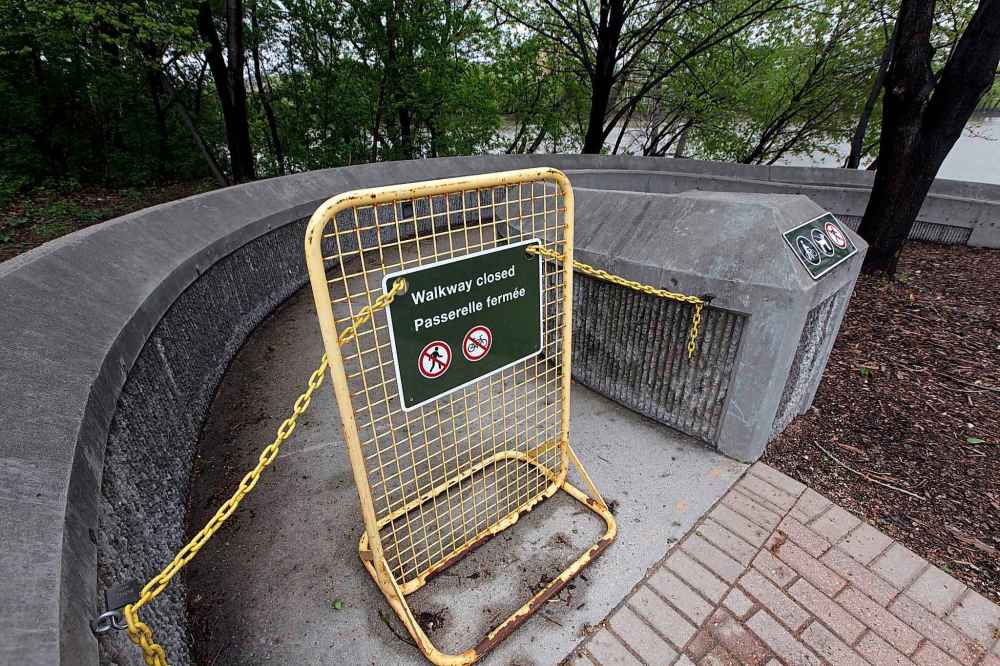 PHIL HOSSACK / WINNIPEG FREE PRESS - The Forks walkway access from the oneida circle is closed. - May 24, 2019.