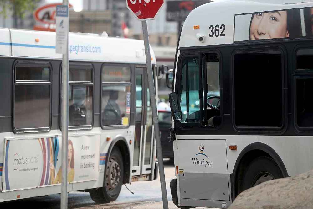 TREVOR HAGAN / WINNIPEG FREE PRESS
Buses with security cameras near their doors, as seen near Polo Park.