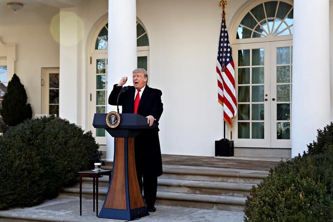 President Donald Trump announces a deal to temporarily reopen the government, Friday, Jan. 25, 2019, from the Rose Garden of the White House in Washington. (AP Photo/Jacquelyn Martin)