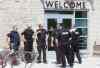 WAYNE GLOWACKI / WINNIPEG FREE PRESS
Winnipeg Police on the scene of the Neechi Commons building on Main Street at Euclid Ave. Wednesday afternoon where a person was taken out on a stretcher and taken to the hospital. Police tape is now along the sidewalk on Main Street.