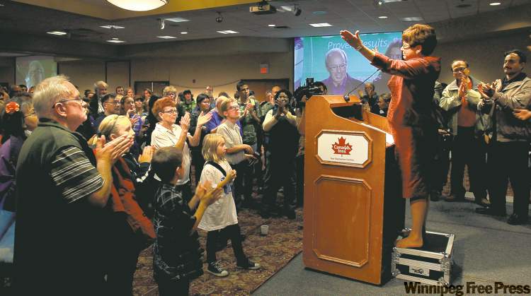 WAYNE.GLOWACKI@FREEPRESS.MB.CA
Judy Wasylycia-Leis addresses her supporters Wednesday night following Mayor Sam Katz’s victory.