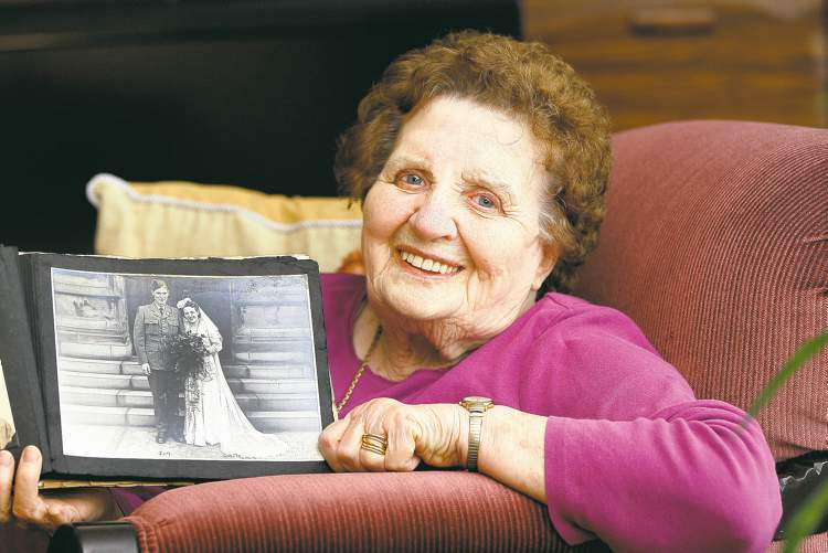 Catherine Cuddy, with her 1943 wedding photo.