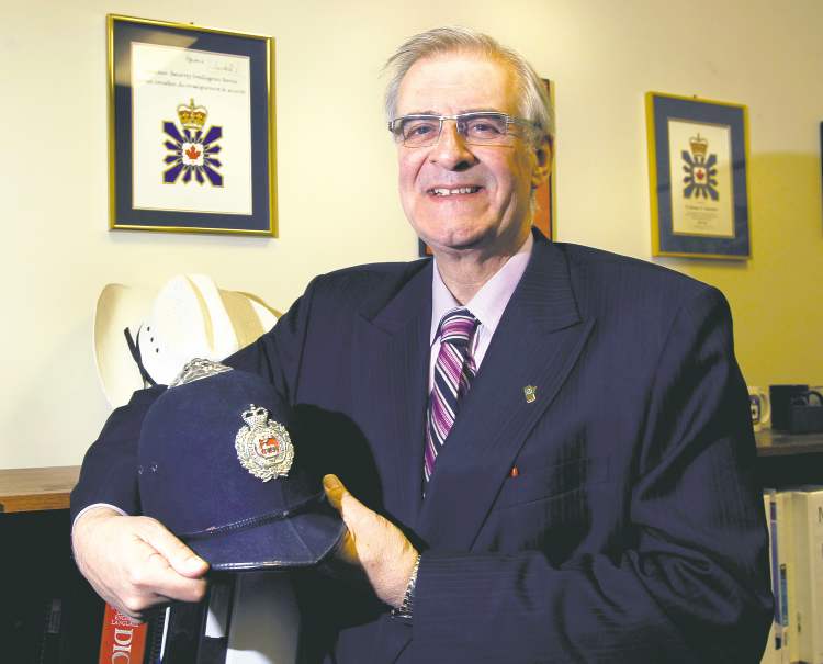 WAYNE GLOWACKI / WINNIPEG FREE PRESS
Graham Starmer with his bobby's hat. The Manitoba Chambers of Commerce president spent the first 27 years of his working life as a police officer and spy catcher in England and Canada.