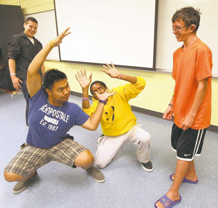 Joe Bryksa / Winnipeg Free Press
Dustin Thompson (from left), Christopher Bryan, Frank Nausigimana and Cody Remillard try out their mime chops.