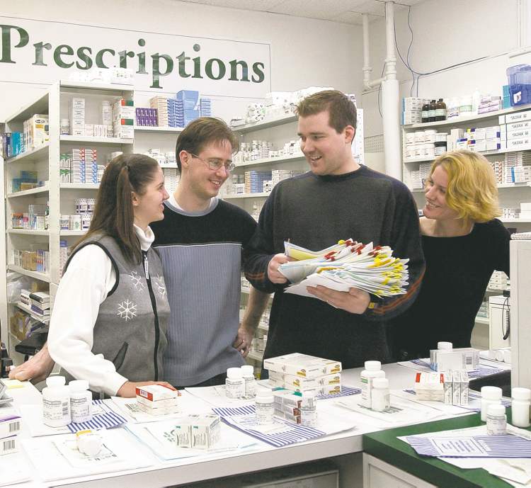 Fred Greenslade / Winnipeg Free Press Archives
Internet pharmacy pioneers Chantelle and Mark Rzepka (left) and Andrew and Catherine Strempler in 2002. Thirteen years later, Andrew Strempler is in the midst of a four-year sentence in a U.S. prison for conspiracy to commit mail fraud.