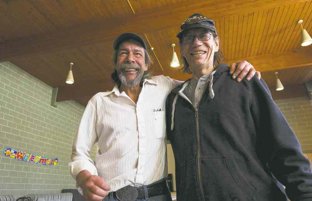 James McPhee (left) and John Thompson both feel volunteering at Agape Table has had a profoundly positive impact on their lives.